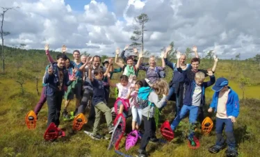 estonia bog shoeing tour group nature experience
